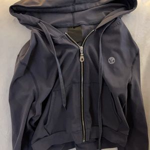 Cropped zip up with hood.